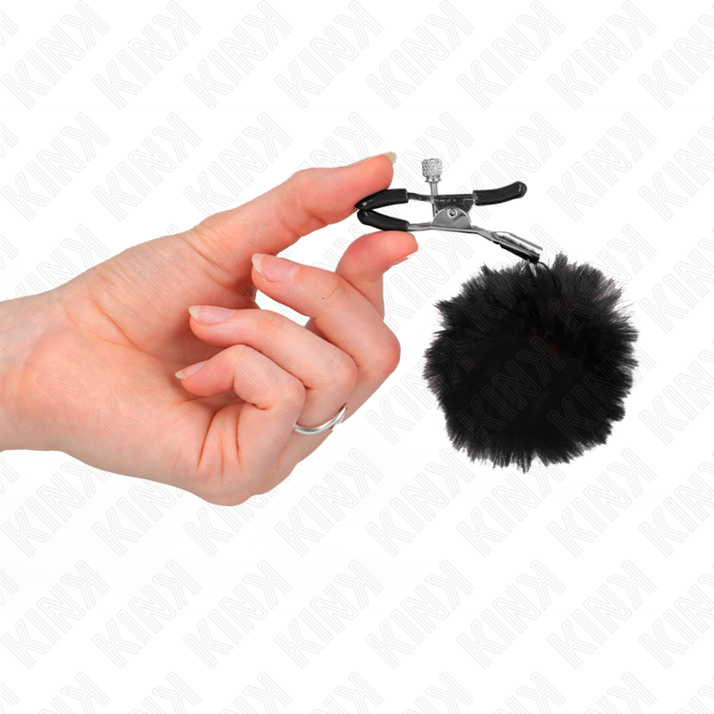 KINK – Pince à tétons avec pompons en fourrure noire
